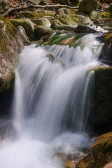 Mountain stream in the spring in the Giant Mountains, Poland .