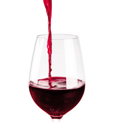 red wine pouring into wine glass isolated