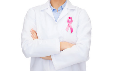 female doctor with breast cancer awareness ribbon