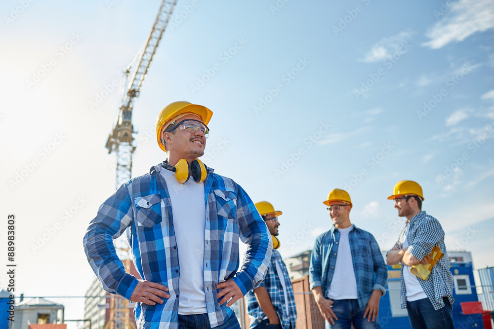 Sticker group of smiling builders in hardhats outdoors