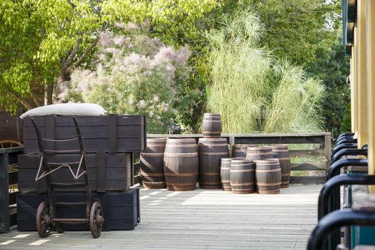 old wine barrels on a platform