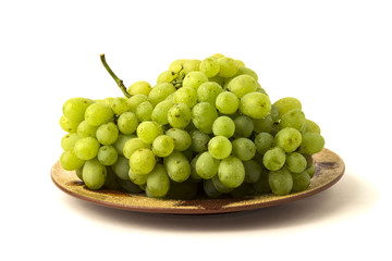Wet grapes on a platter