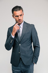 Portrait of a pensive businessman looking away