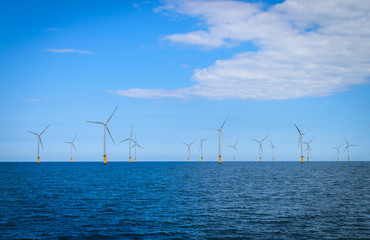 Offshore Wind Turbine in a Windfarm under construction off the England