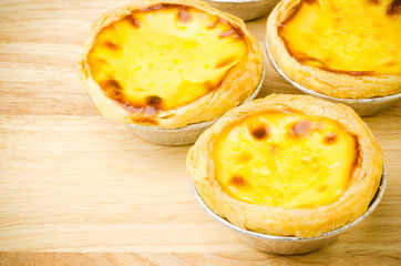 Egg tart on wooden background