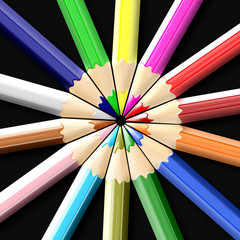 Naklejka premium Colored pencils or crayons isolated on black background