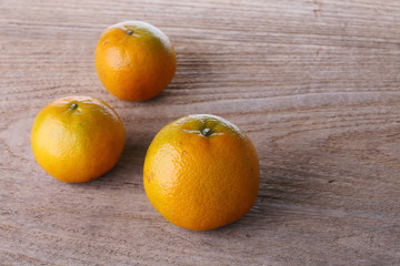 oranges fruit on brown wood table