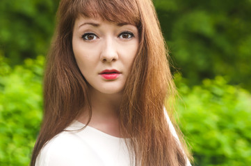 Naklejka premium A young female closeup on green