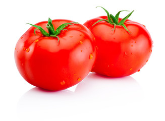 Two wet red tomatoes isolated on white background