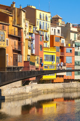 Fototapeta na wymiar Colorful houses near Onyar river, Girona (Spain)