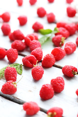 Fresh raspberries on wooden table, closeup