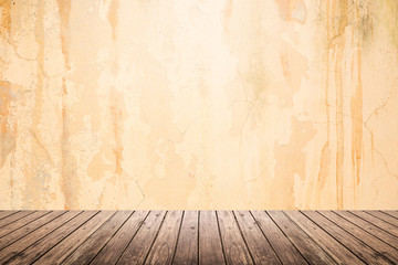 Empty room of grunge wall and wooden floor