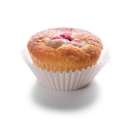 Delicious cupcake with berries isolated on white