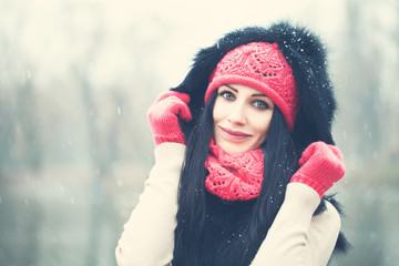 Winter Girl Outdoors. Portrait of Happy Woman