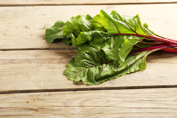Fresh swiss chard on wooden table, close up