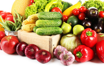 Composition with fresh fruits and vegetables on white background