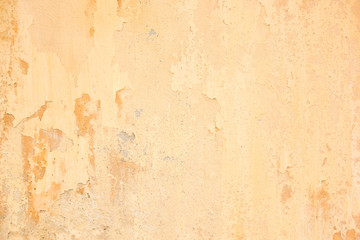 Fototapeta na wymiar old grunge cracked orange concrete wall