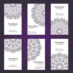 Set of six business cards.