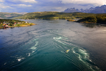 Boat in Saltstraumen current, Bodo, Norway