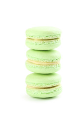 Tasty green macarons isolated on white