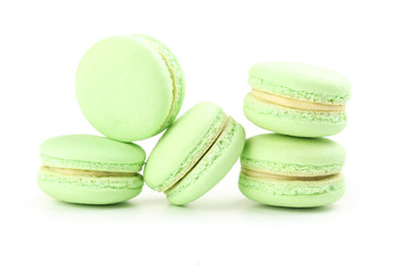 Tasty green macarons isolated on white