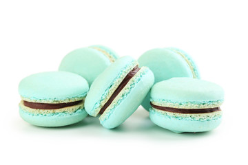 Tasty blue macarons isolated on white