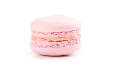 Tasty pink macaron isolated on white