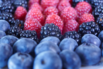 some sort of berries: blueberries, blackberries, raspberries