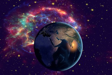 Planet Earth on the background with stars and galaxies, the Earth from space showing Arabian peninsula and Africa on globe in the night time, elements of this image furnished by NASA