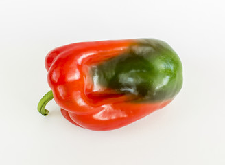 red pepper over white background