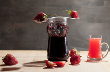 strawberry jam in jar and strawberries 