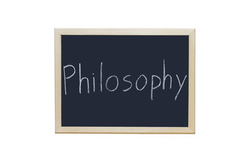 Philosophy written with white chalk on blackboard.