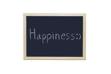 Happiness written with white chalk on blackboard.