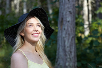 Beautiful smiling woman in nature