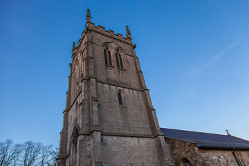 Fototapeta na wymiar Church tower and blue sky