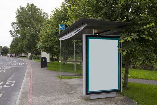 Blank billboard in a bus shelter