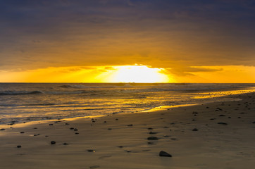 Sunset over the coast of Atlantic ocean