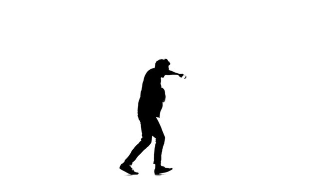 Young, stylish man continue doing brake dancing movements, on