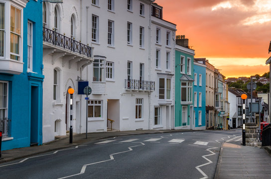 Deserted Street and Colourful Buildings at Sunset