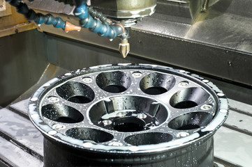 Car alloy black new rim in milling and lathe machine.