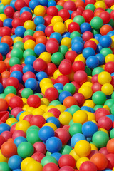 Fototapeta na wymiar plastic colored balls background