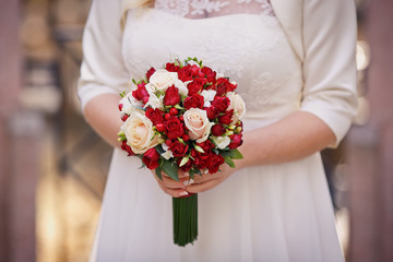 Wedding bouquet in bride's hand