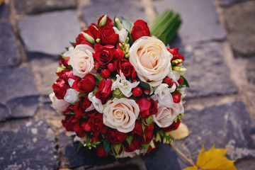 Brides bouquet of red and white roses