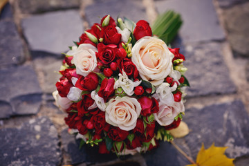 Brides bouquet of red and white roses