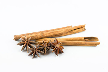 Star anise and cinnamon on white background