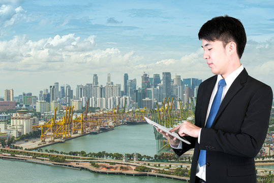Business man using digital tablet communicate global business