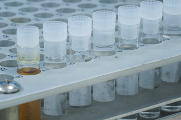 Sample vial in aluminum rack