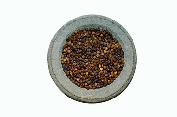 Black pepper in stone spice grinder, isolated on white