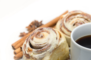 Cinnamon rolls and coffee isolated
