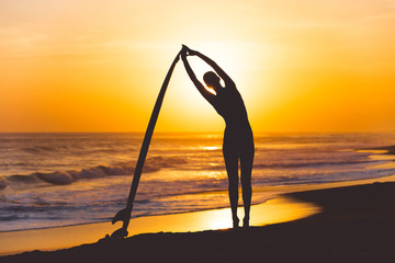 Yoga with surfboard